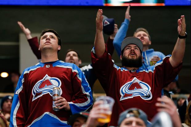 Colorado Avalanche Fan Catches Puck, Elbows Girlfriend, Then Gives Puck To Another Girl