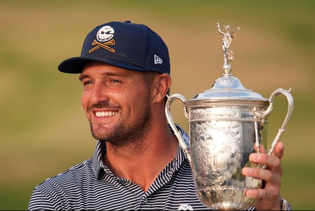 Bryson DeChambeau Is Carrying The U.S. Open Trophy Through The Streets Of Nashville