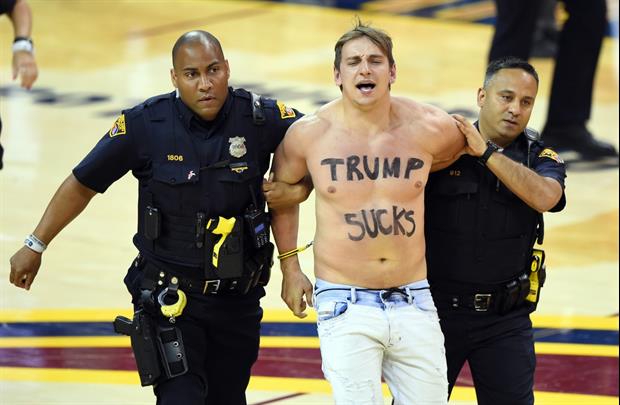 Fan Storms Court With ‘Trump sucks’ On Chest 'LeBron for President' On Back