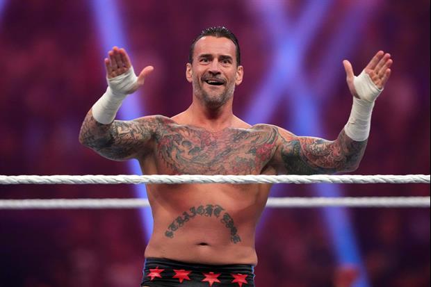 CM Punk Smacks Away Fan's Phone In Hotel Lobby After WrestleMania Loss