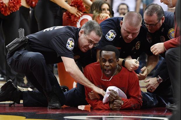 Louisville Fan Rushes Court Interrupts Miami's Huddle, Then Gets Arrested
