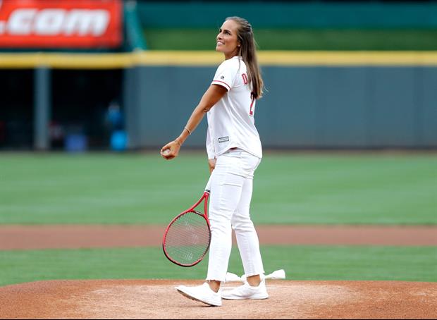 Tennis Star Monica Puig With The Oddest First Pitch Ever Before Reds/Cubs Game