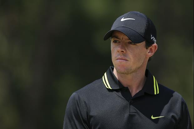 Rory McIlroy Gets Destroyed In Arm Wrestling Match To Junior Golfer