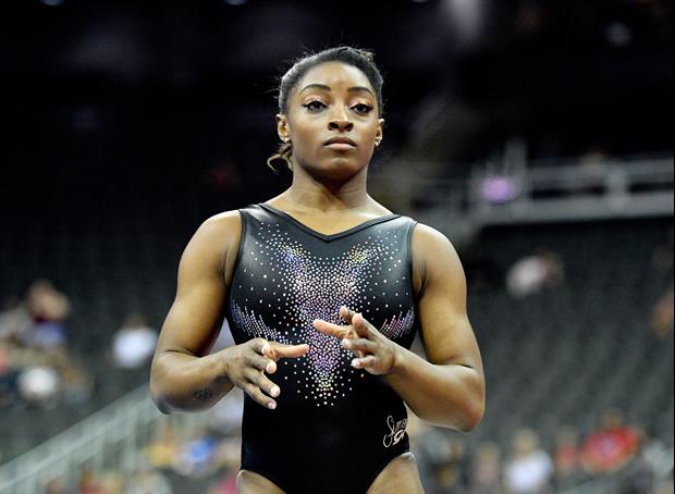 Watch Gold Medal Gymnast Simone Biles Undress Herself While Doing A Handstand