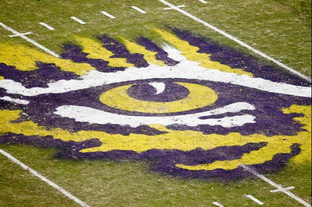 LSU Fan Covers His Hand With Tiger Eye Logo Tattoo