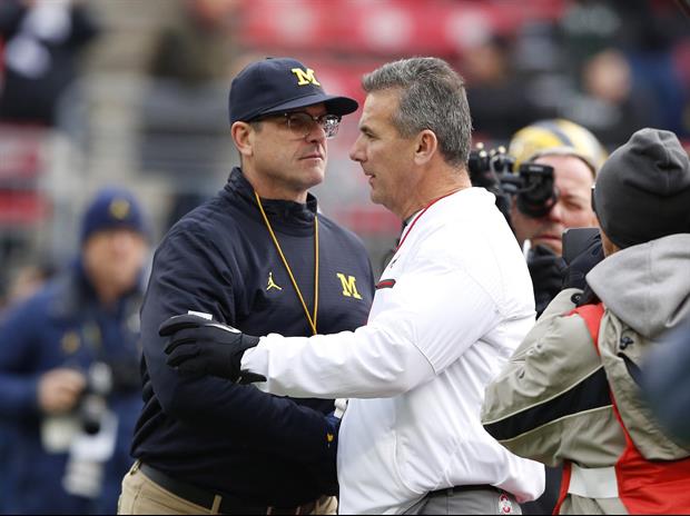 Urban Meyer Wears National Champs Jacket While Speaking To Michigan Camp